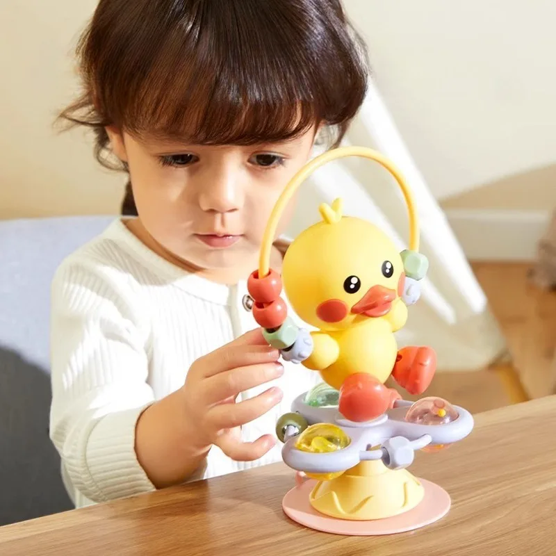كرسي الطعام، أكواب شفط، ألعاب موسيقى دوارة، قبضة ألغاز التعليم المبكر، خشخيشات للأطفال البطة المهدئة بعمر 0 سنة واحدة