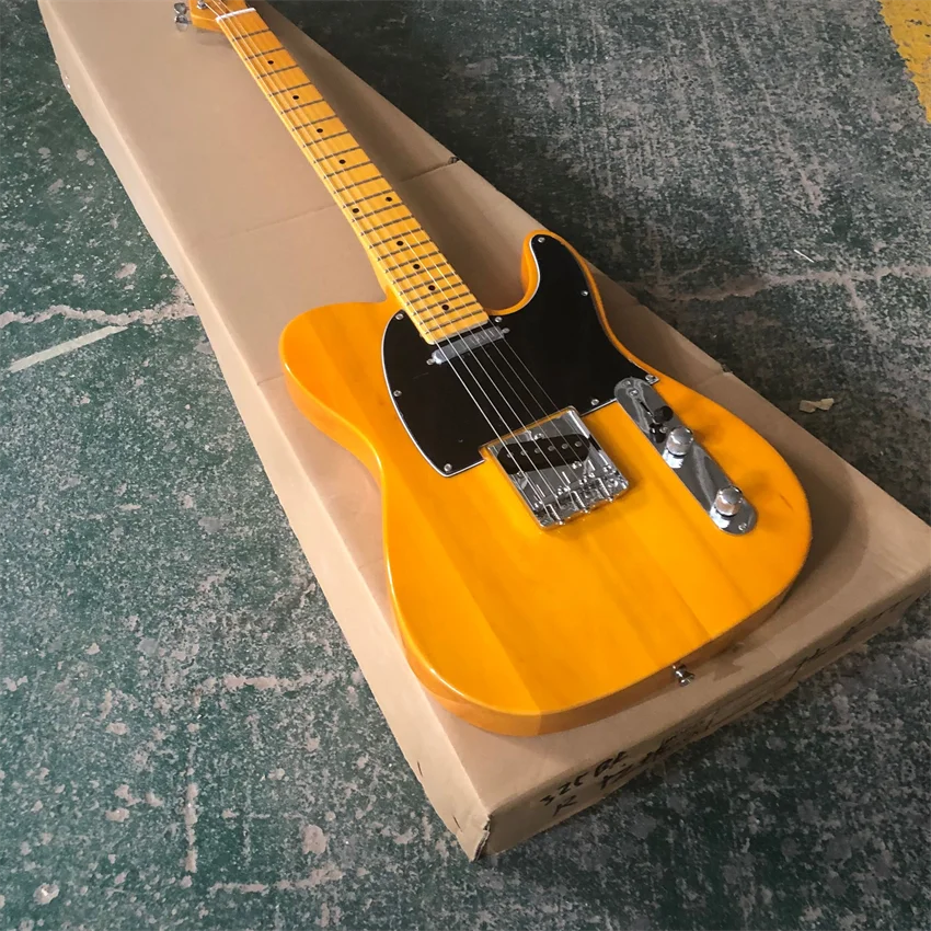 

New yellow electric guitar, grade a wood, cow bone string pillow, real photos, free shipping