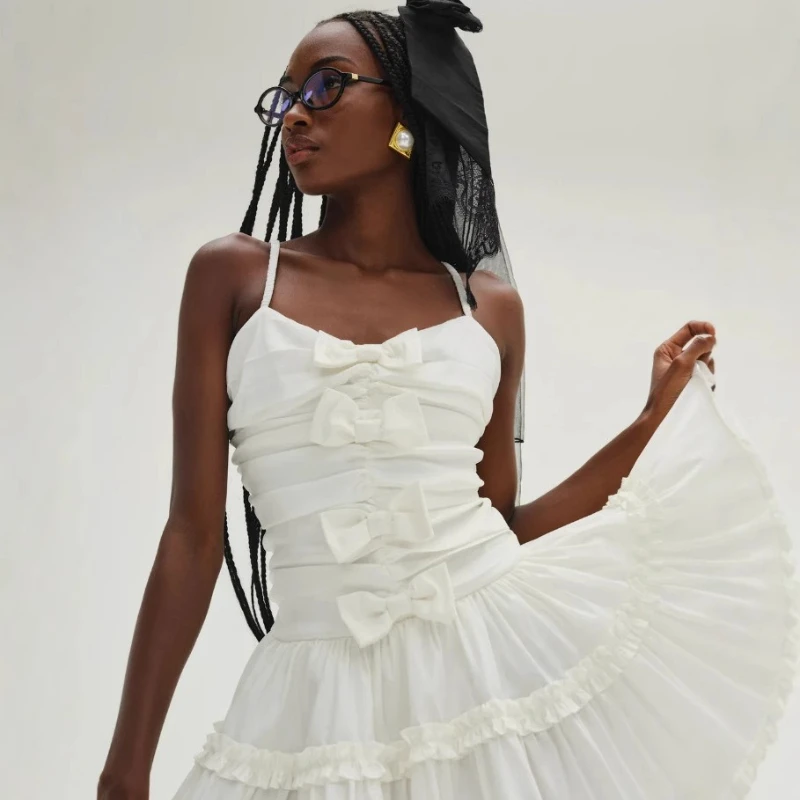 

2025 Women's Fashion French Style White Bow Layered Skirt Slim Elegant Spaghetti Strap Dress