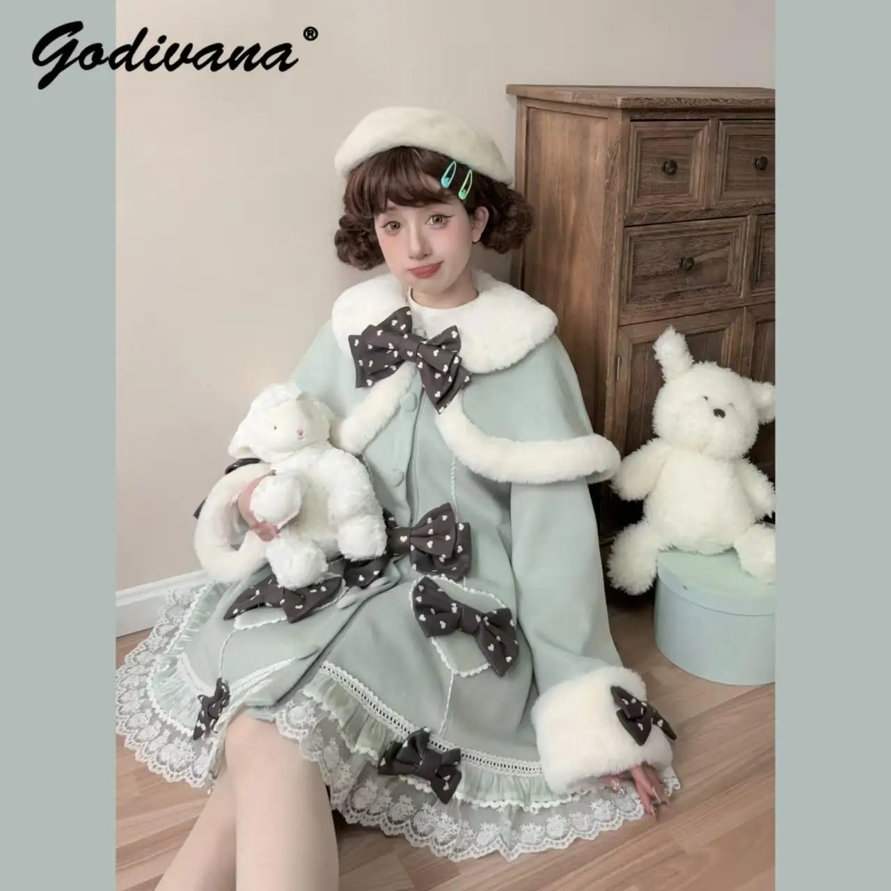 Nouveau hiver femmes doux fourrure arc Lolita laine manteau col de poupée filles mince dentelle épissé simple boutonnage laine veste pardessus