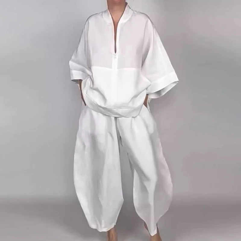 بنطال رياضي صيفي غير رسمي للنساء 2026 ربيعي عالي الخصر بجيوب فضفاض بلون سادة بخصر مطاطي للنساء ملابس