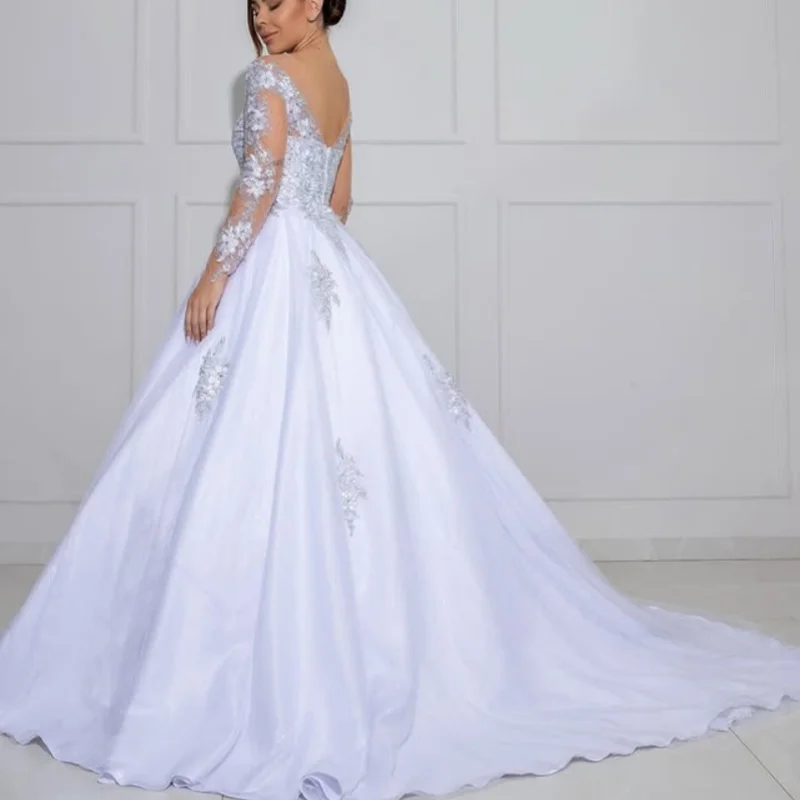 Op maat gemaakte ivoorwitte spaghettibandjes Kant Applicaties Trouwjurken Lange mouwen kralen satijnen bruidsjurken Gemaakt jurk