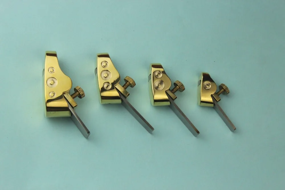 

4 pcs new style various convex bottom brass planes, Violin/Cello making tools