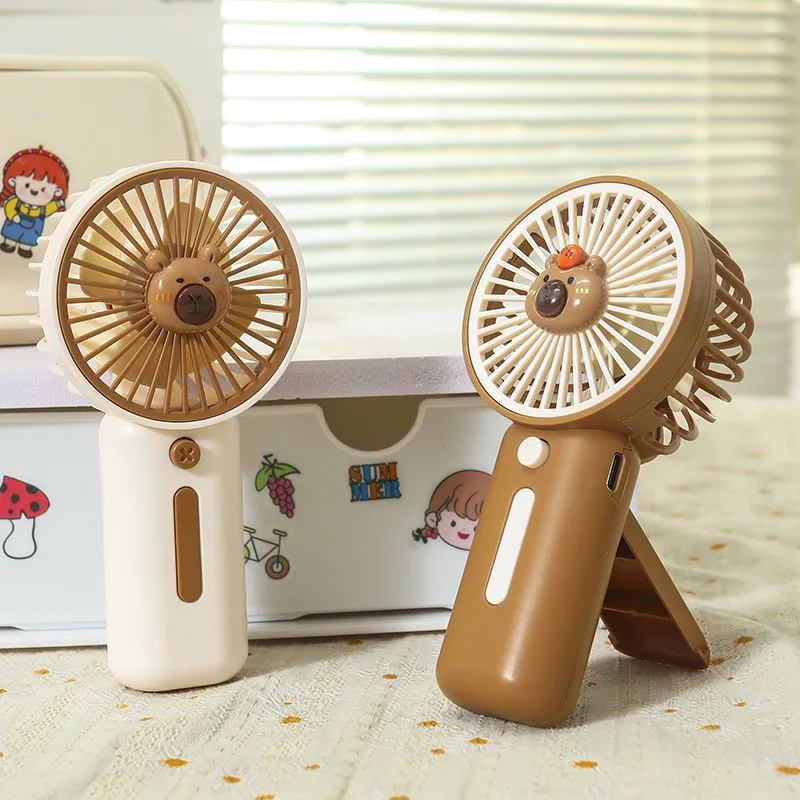 Ventilador pequeño portátil de escritorio con soporte oculto minimalista, ventilador portátil de viaje de verano para estudiantes de alta potencia eólica de tres velocidades