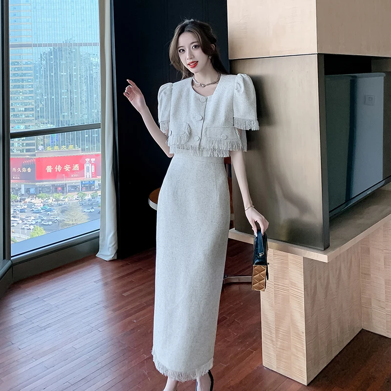 High Quality Elegant Lady Two Piece Sets Summer New Puff Sleeve Tassel Temperament Short Tops + High Waist Long Skirt Suits