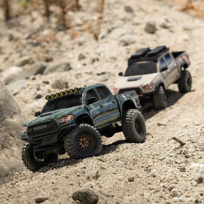 Axial 1/30 Scale SCX30 Tacoma 4-Wheel Drive 2S Brushed RTR Remote Control Off-Road Vehicle Equipped with Large Tread Tires
