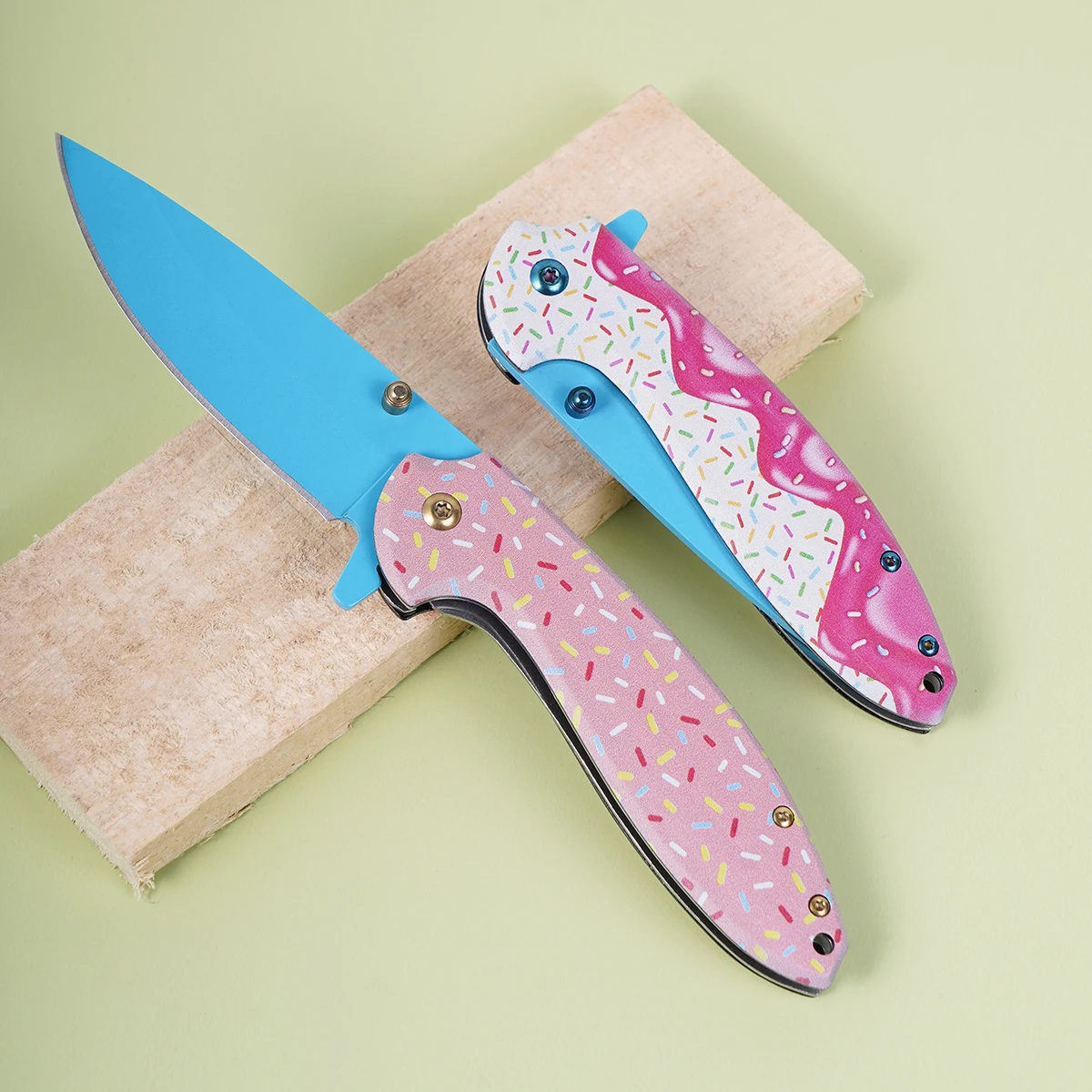 2026 new Outdoor EDC KnifeHigh-quality folding knife stainless steel bright blue blade, donut pattern handle, sharp and durable.