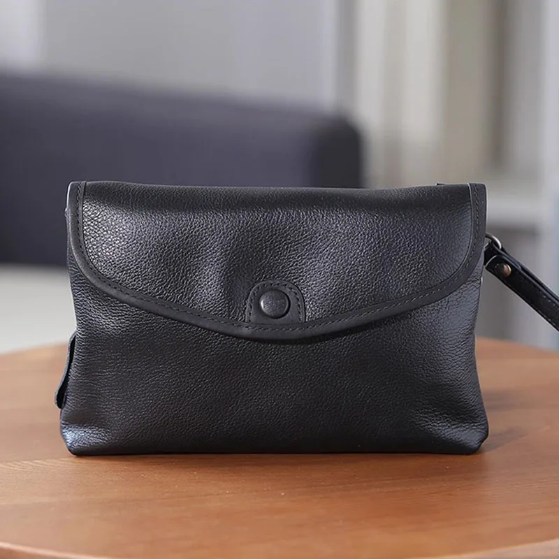 AETOO Genuine leather crossbody small bag for men, trendy and niche design, flip single-shoulder bag, multi-functional top layer