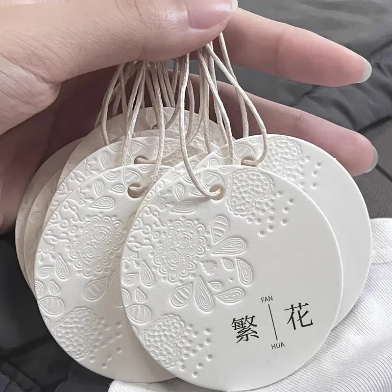 High End Customized Clothing Hang Tags Special Paper Pressure Concave Hangtags Recyclable Printing Swing Tags