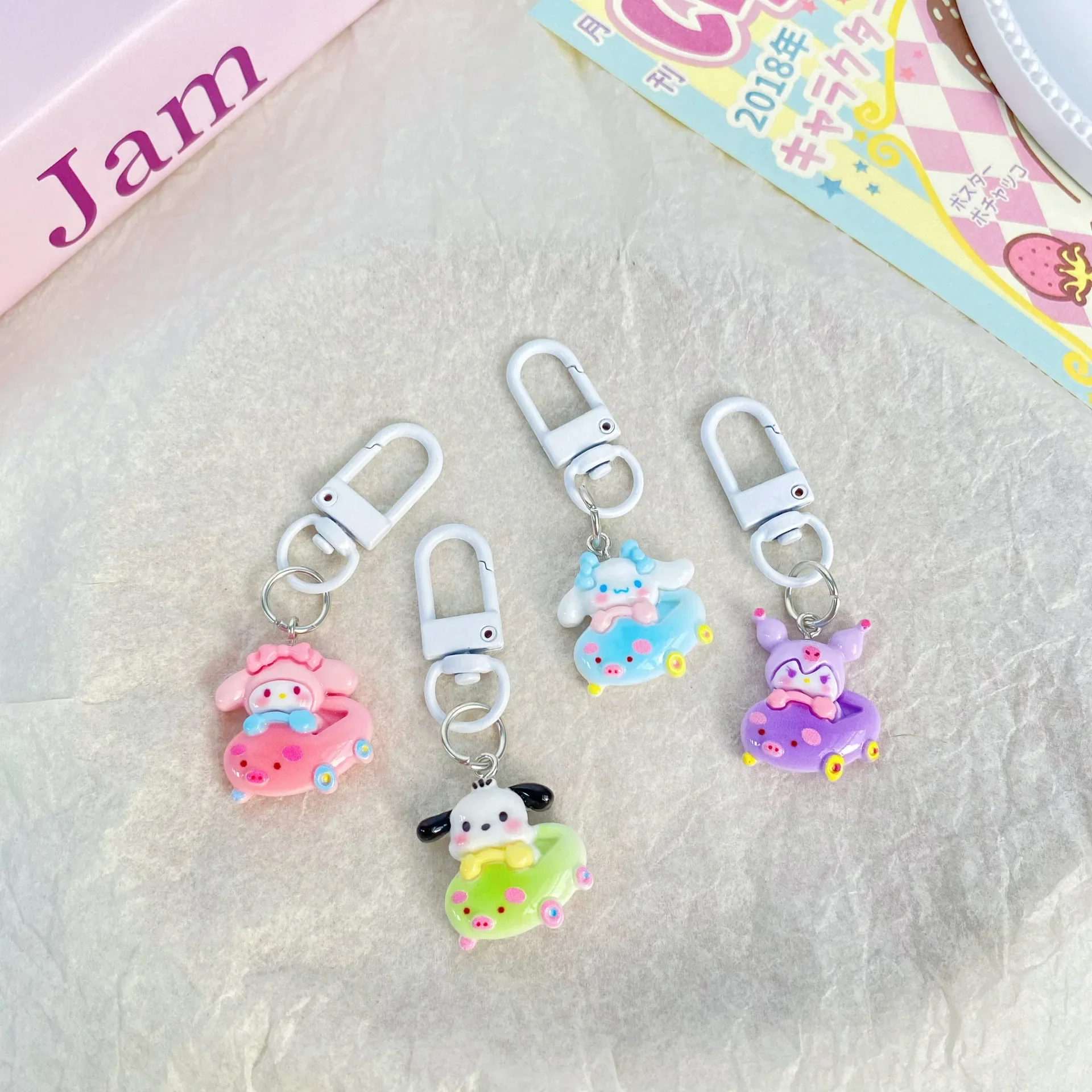 New Sanrio Figure Driving Car Series Keychain Kawaii Cinnamoroll Pochacco Glossy Resin Key Chain Girls Kids Backpack Accessories