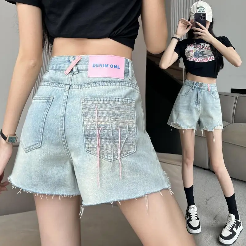 

Perforated denim shorts for women's summer 2024 new high waisted slimming wide leg loose A-line oversized hot pants trend