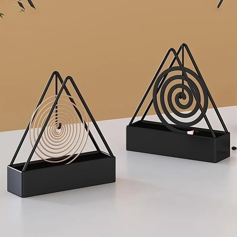 Triangular mosquito coil holder, metal ash catcher, modern base. Indoor/outdoor, easy-clean, sturdy. Minimalist desk design.