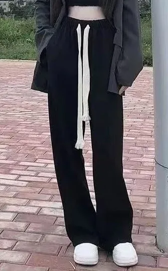 بنطال ذو قصة أرجل واسعة للنساء صيفي رفيع للغاية مثقوب مفرغ واسع الأرجل مقسم محب ناعم مطابق للتهوية قابل للتمدد 2025