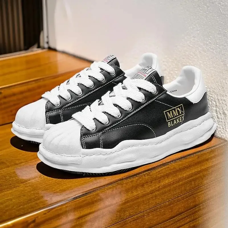 Eenvoudige en sfeervolle leren canvasschoenen en veelzijdige, ademende, comfortabele casual sportschoenen