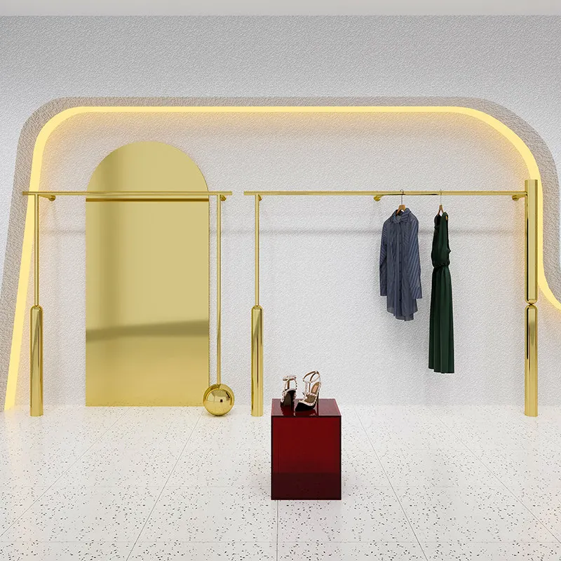 

Настенная вешалка для одежды от пола до потолка из нержавеющей стали с титановым золотым покрытием для демонстрации женской одежды в магазине.