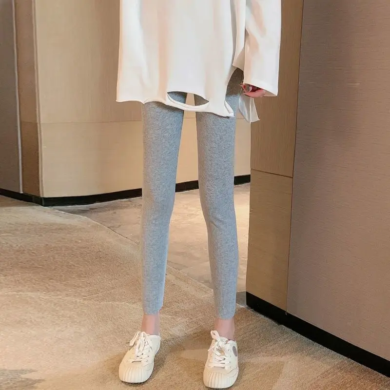 Leggings Flare femme pantalons printemps brillant noir dames grande taille Simple quotidien côtelé givré lavage à l'eau poches côté maille Ol