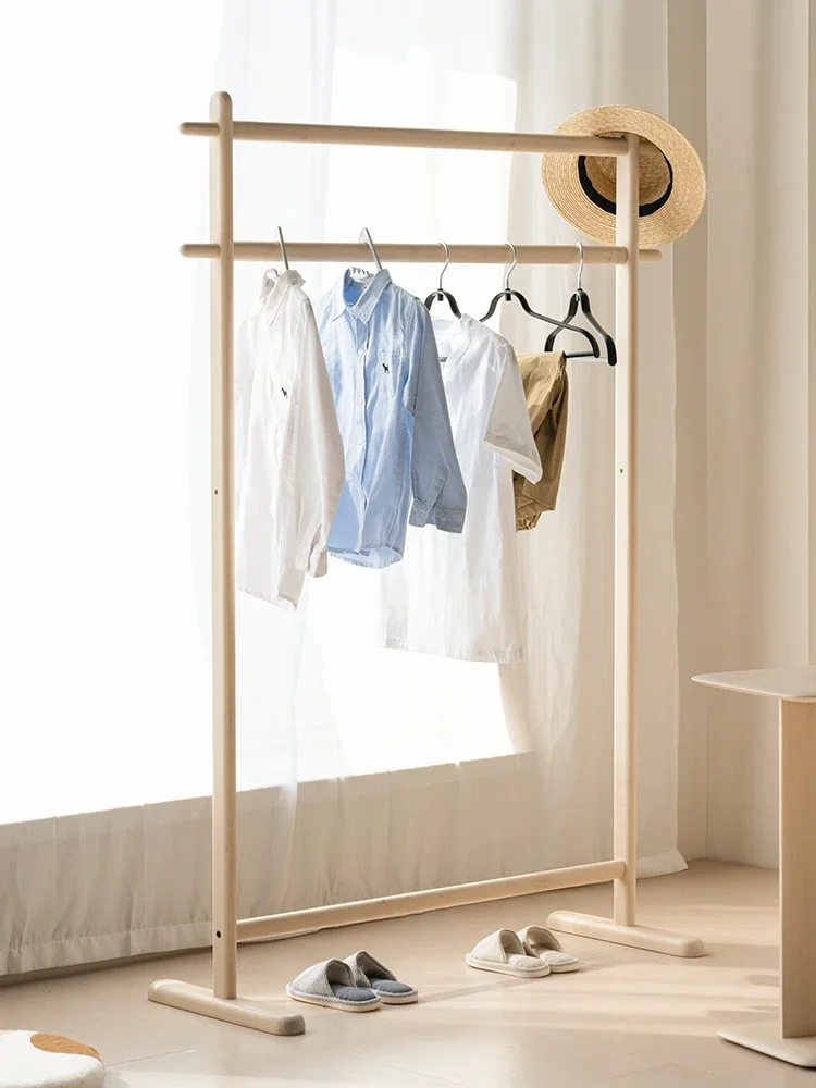 Solid wood hangers for floor-to-ceiling bedrooms, simple interiors, and do not occupy an area