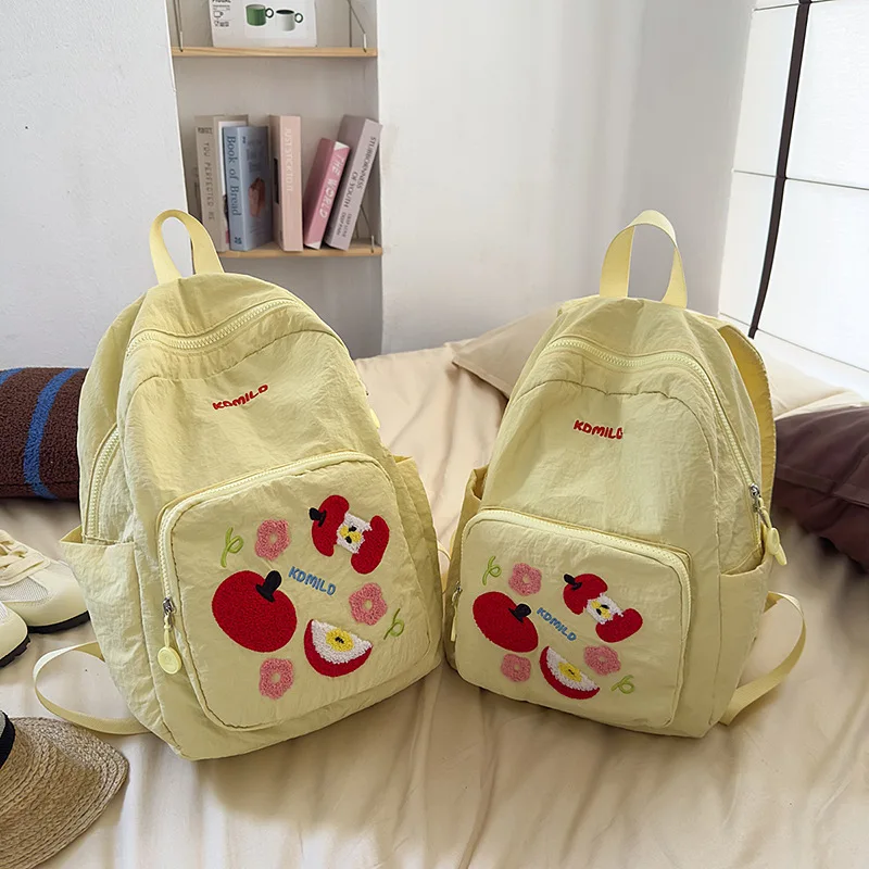

Cute Embroidered Apple Backpack for Female High School Students, High-Value Japanese Style Casual Lightweight Large Capacity Tra