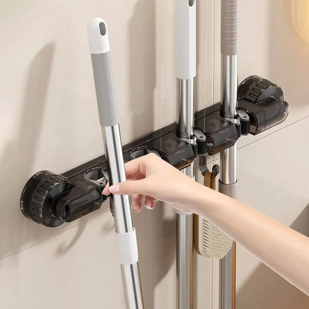 

4 Clips Suction Cup Mop Holder Wall Mounted Space Saving Broom Hanger with Hooks Traceless Mop Clip Holder Kitchen