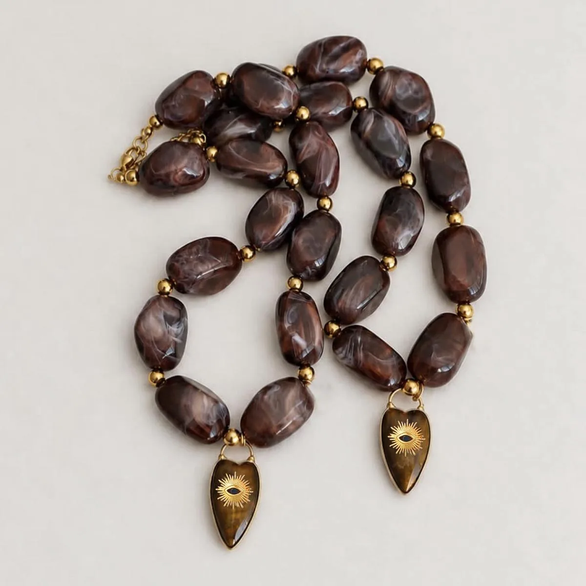 2026 Elegant Retro Fashion party jewelry with aura Big resin bead bib statement necklace big tiger eye stone Heart pendant