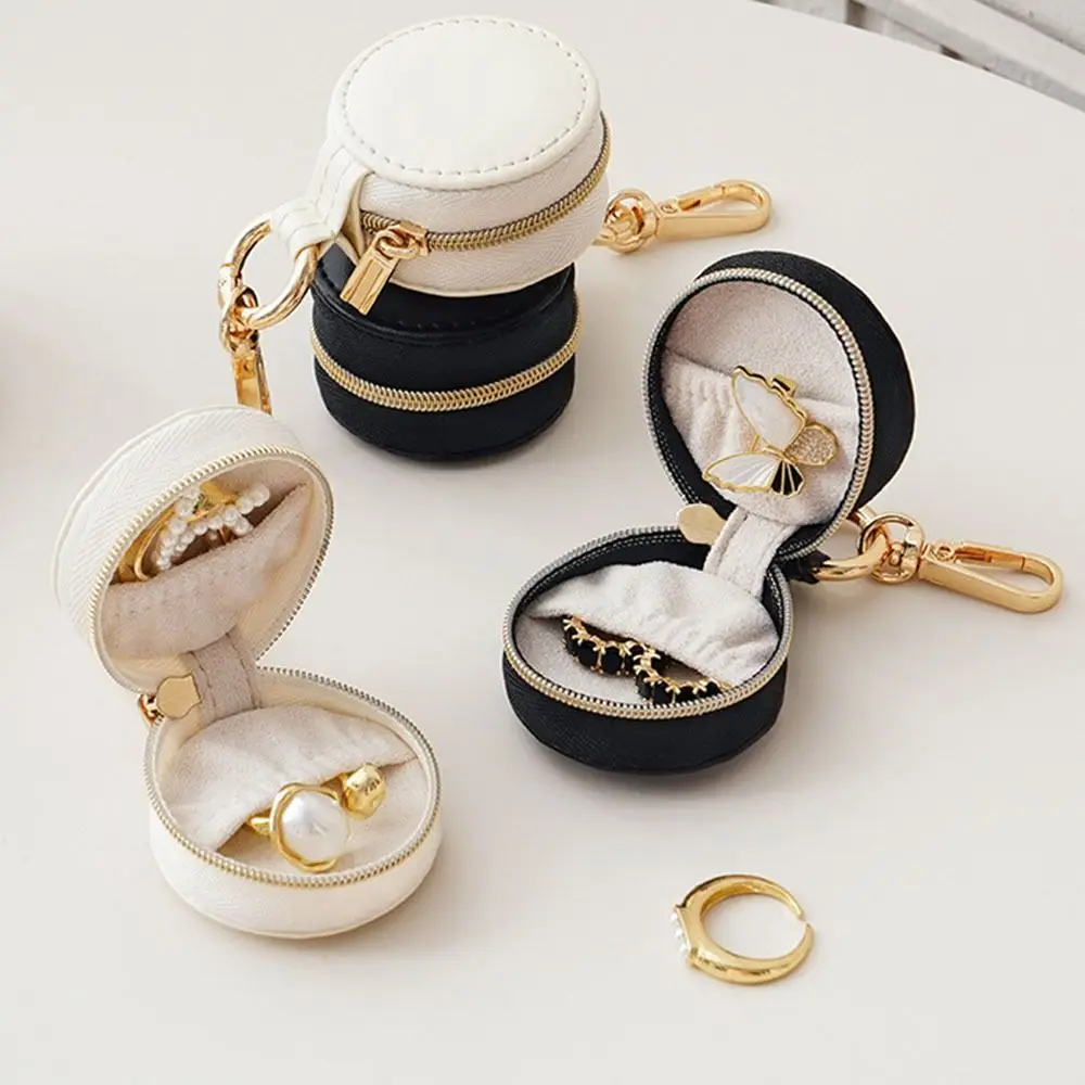 

Creative Solid Colored PU Jewelry Case PU Leather Round Jewelry Storage Box Lightweight With keyring Necklace Ring Case Travel