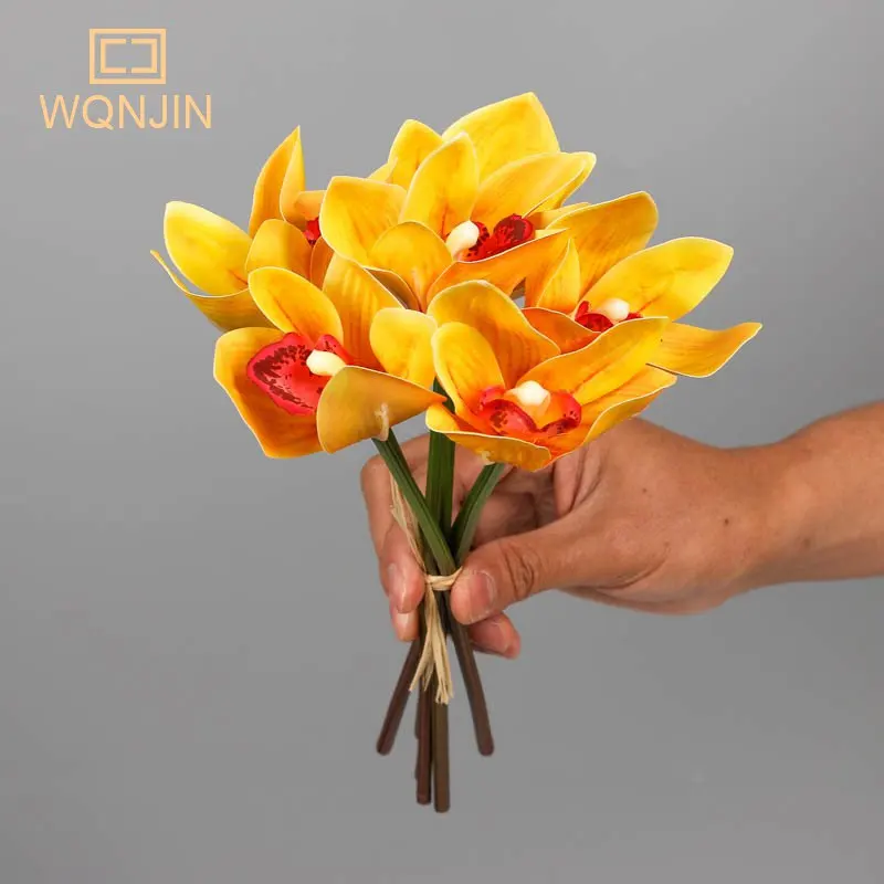 6pcs/lot Simulated Bouquet Cymbidium Magnolia Hand Holding Flower Hand Binding Cymbidium Silk Flower Home Decoration Wedding