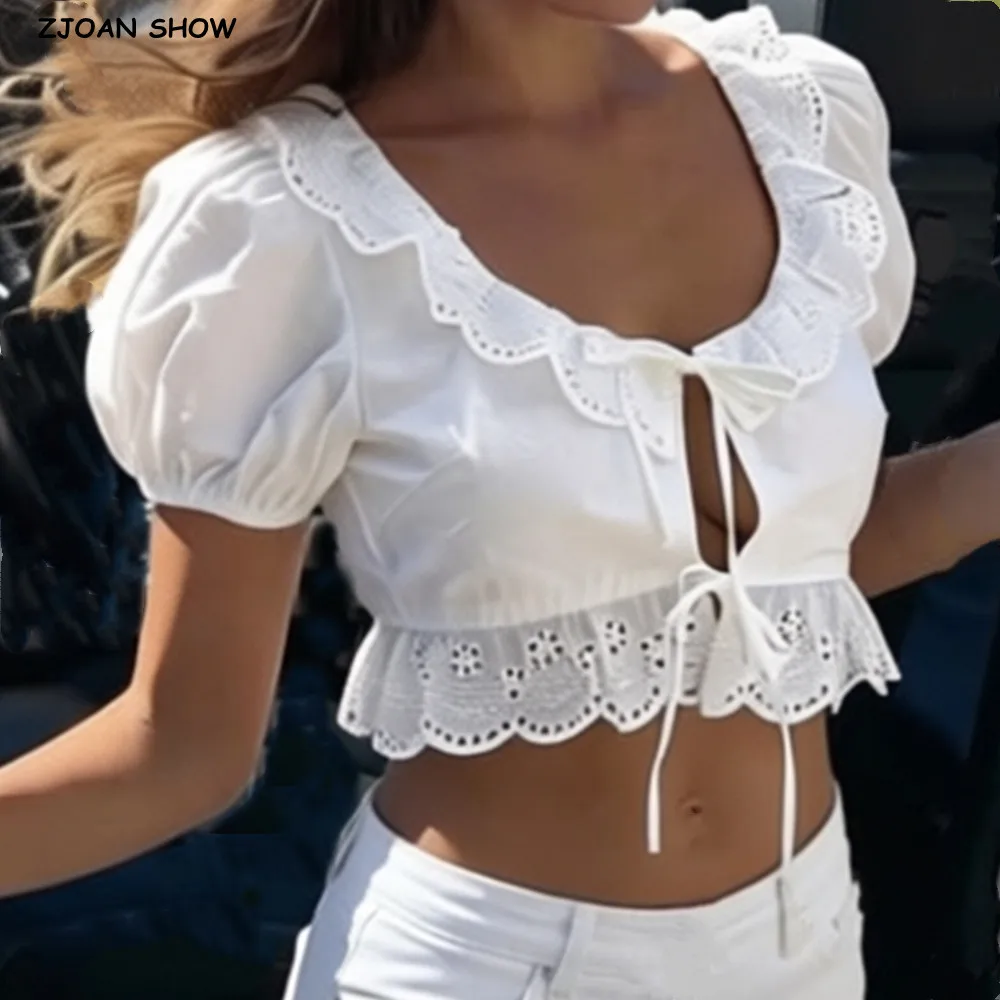 

Sexy White Embroidery Hollow Out Hole Wood ears O neck Short Puff Sleeve Shirt Women Ruffles Hem Front Bow Lacing Up Crop Tops
