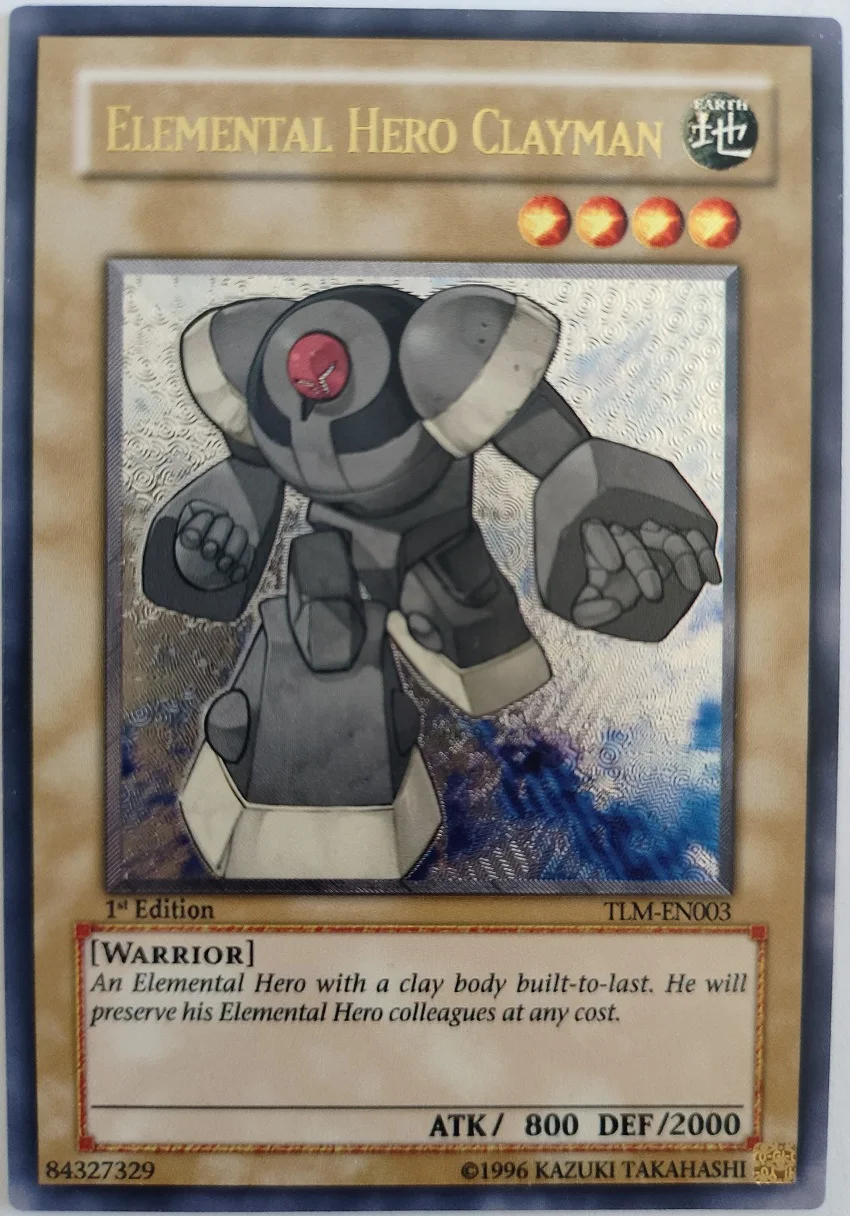 Yu-Gi-Oh Elemental HERO Clayman TCG UTR TLM-EN003 Brinquedo de Cartas Colecionáveis para Crianças - Item de Hobby Não Original