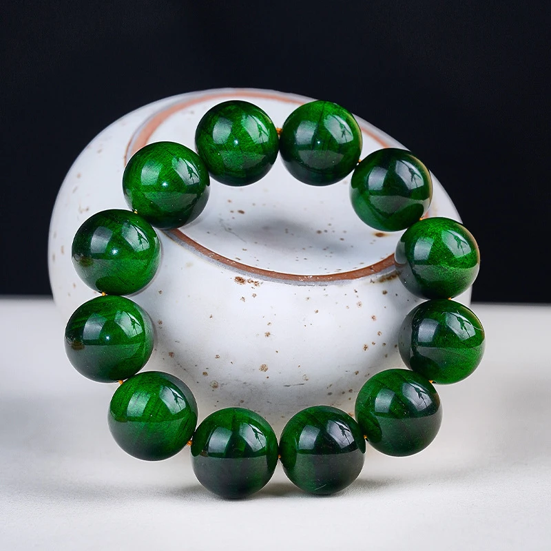 

Grain-patterned, richly oiled blood dragon bracelet, translucent Northeast agarwood, pine nut amber wood Buddhist beads, un