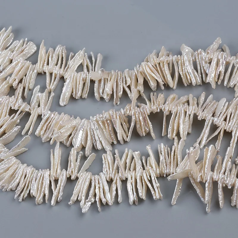 

Hot Wholesale 5-7*25mm White Long Biwa Freshwater Peal Beads Strand