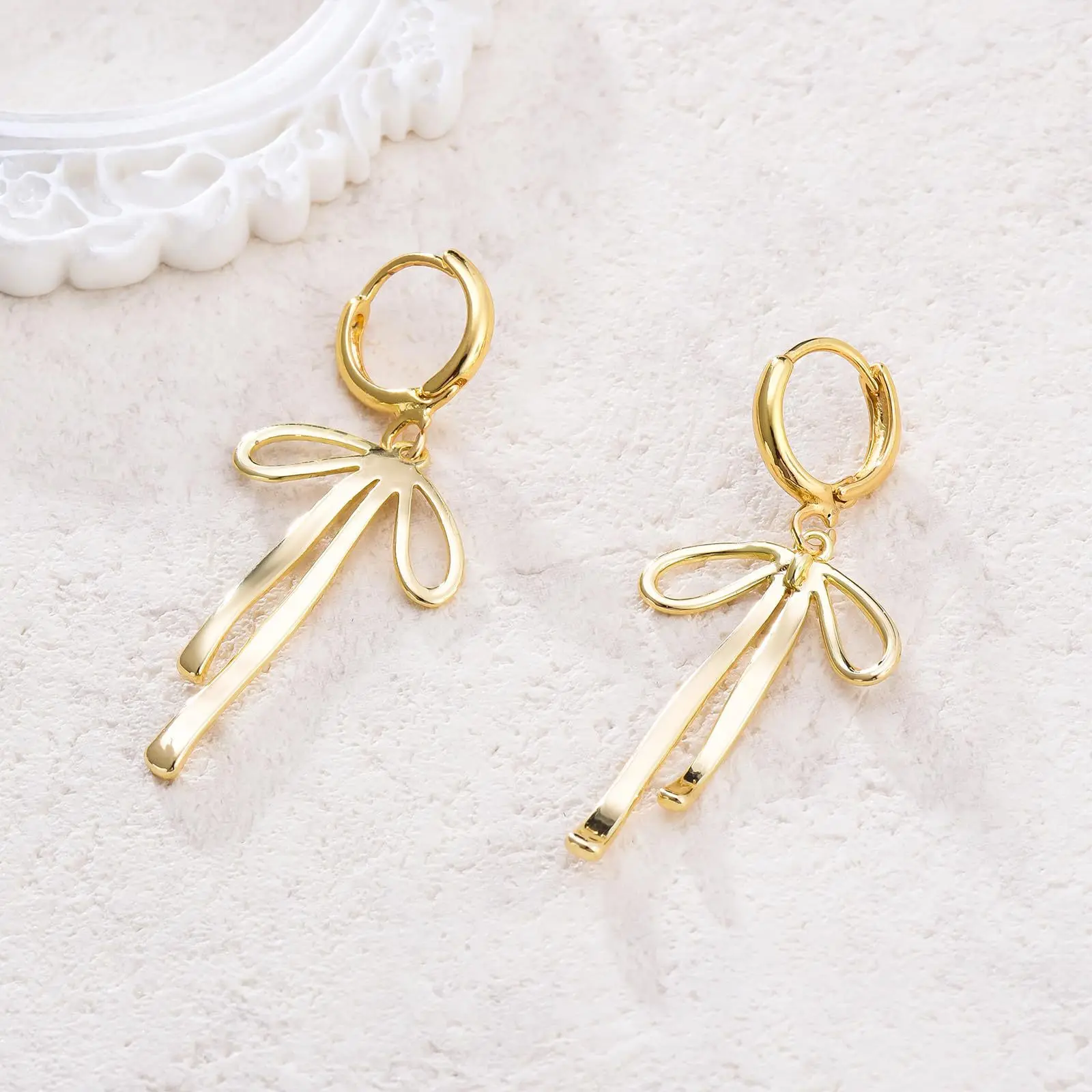 Brass real gold plating, hot-selling, bow line earrings, earrings, earrings.