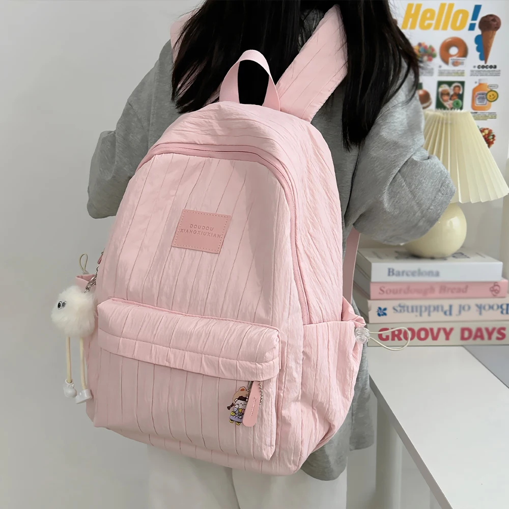 Lightweight schoolbag female college student niche design simple and versatile backpack primary and secondary school students casual travel backpack