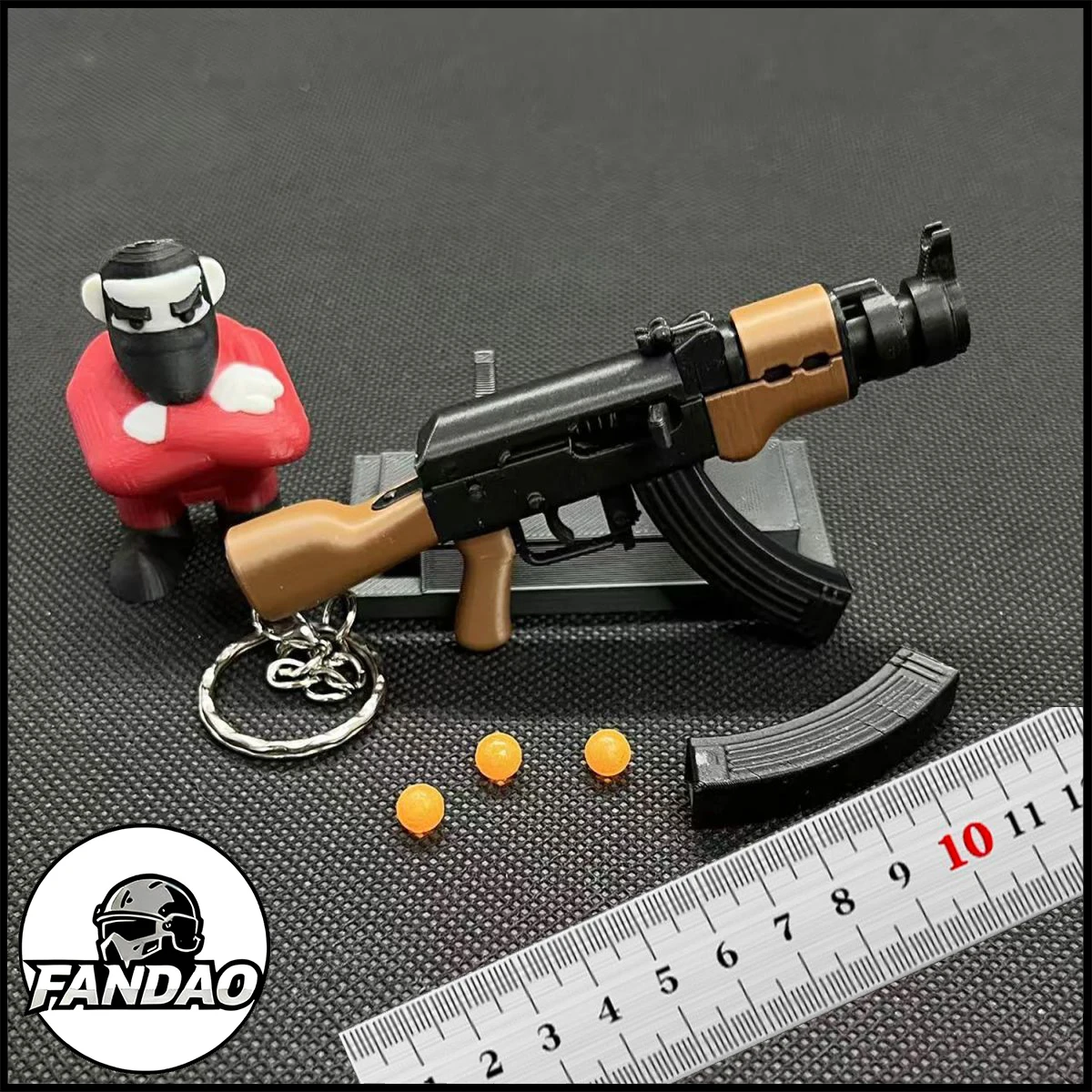 سلاسل مفاتيح صغيرة AK47 مع خراطيش طبل المجلات 50 رصاصة بلاستيكية نماذج لعبة قابلة للإطلاق لحقيبة الظهر قلادة هدية للرجال