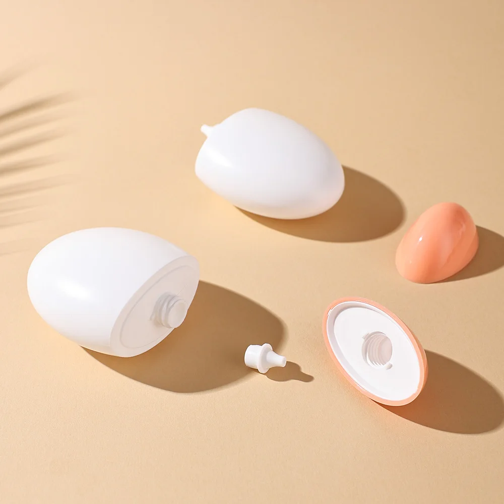 2 個 50 ミリリットルホワイト & オレンジキャップ卵型 PE 空のローションプラスチックボトルセット詰め替え旅行容器日焼け止め化粧品用