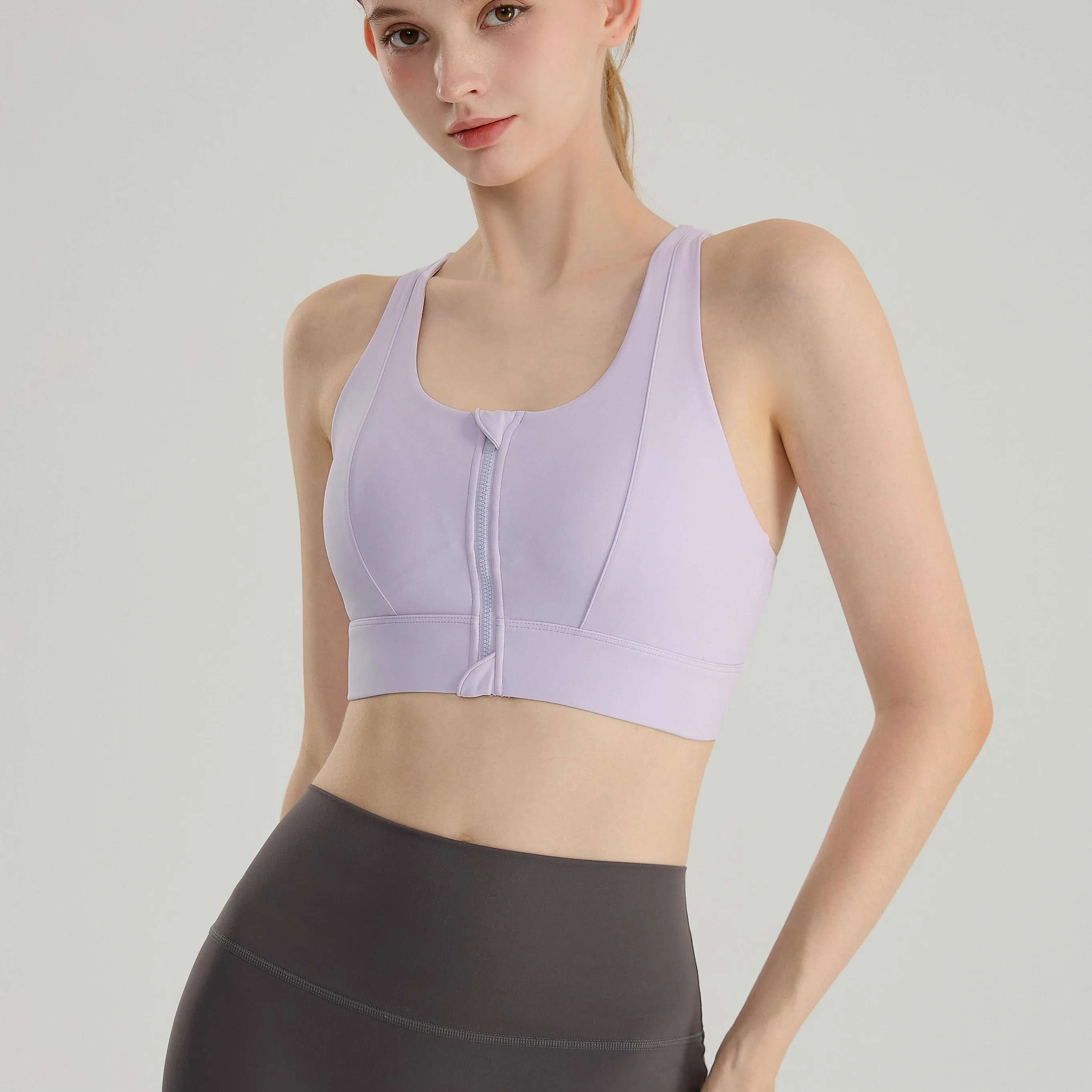 Reggiseno sportivo per donna Yoga Fitness Yoga Top reggiseni Nylon traspirante tinta unita supporto medio palestra Crop Top imbottito abbigliamento sportivo