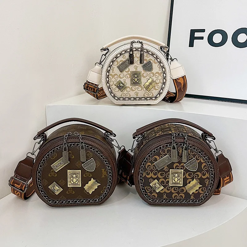 

Новая женская мини-сумка 2025 года — модный принт значка, текстурированный рюкзак через плечо с круглым медведем