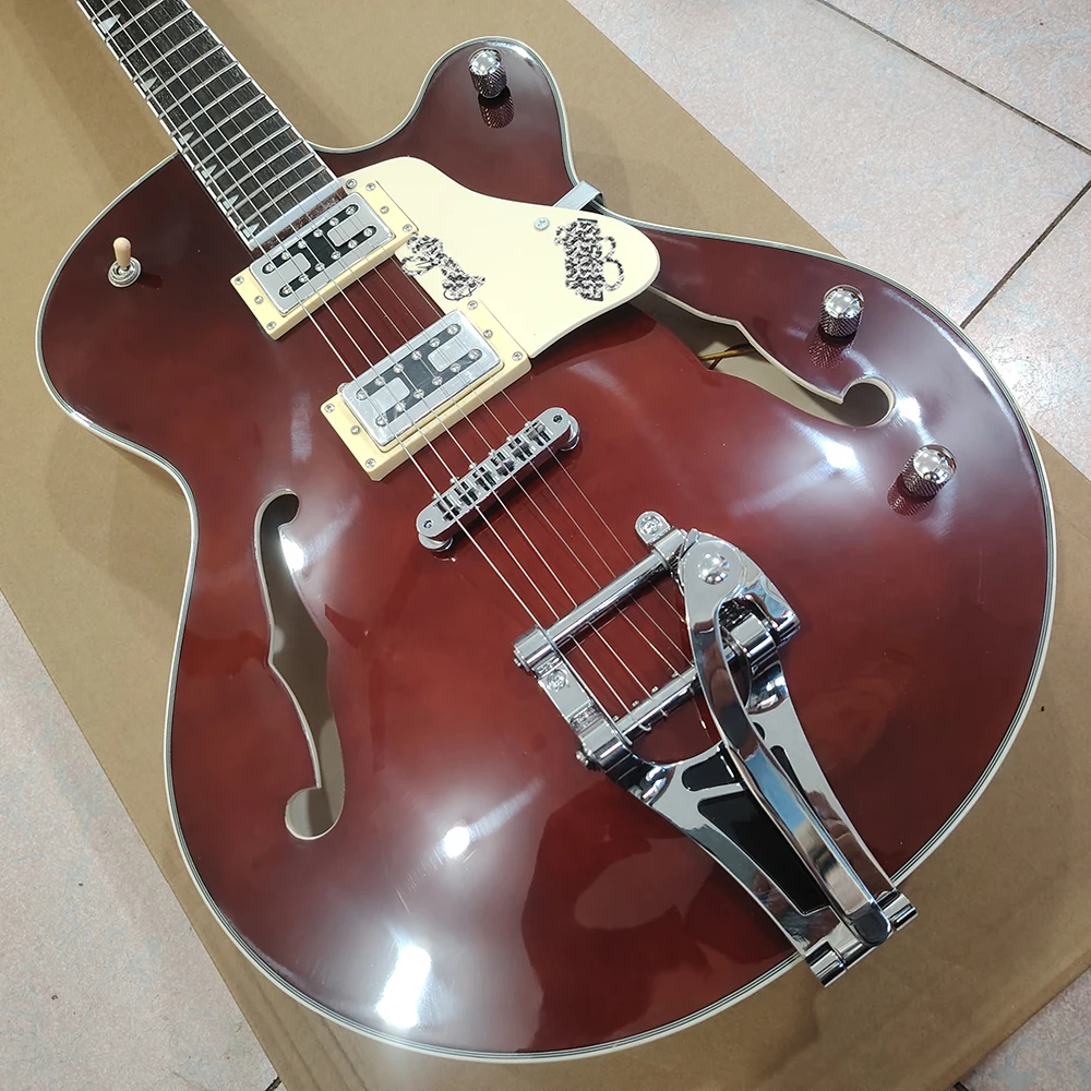 High quality wine red electric guitar, dual f-holes, large vibrato system, in stock for quick delivery