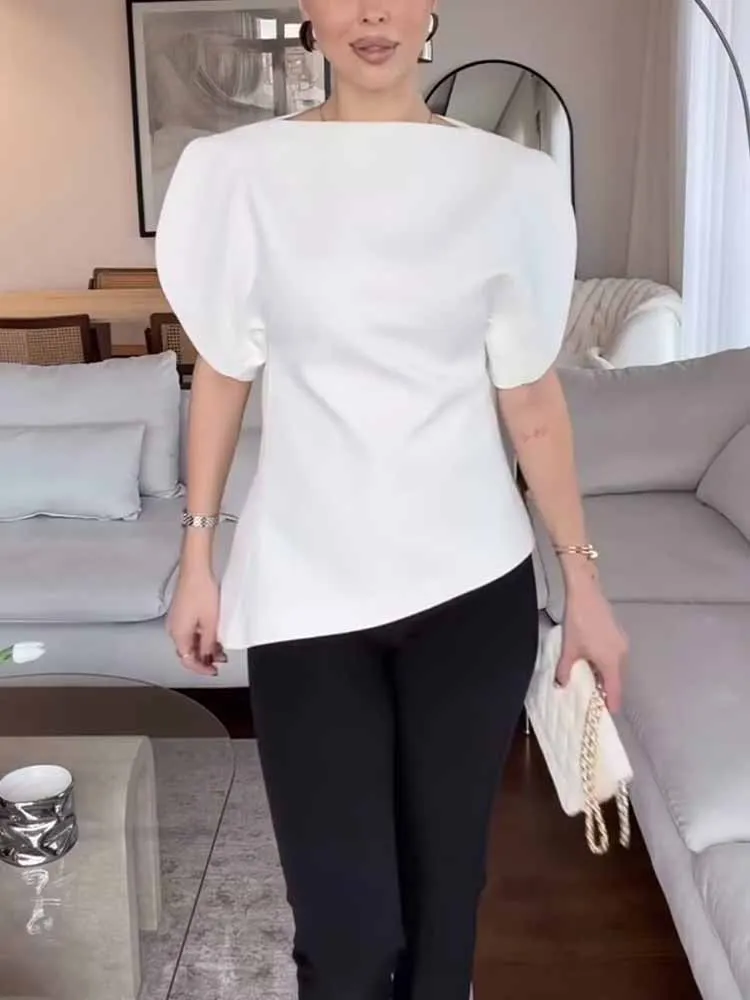 

Новое поступление зимы в европейском и американском стиле, модный простой и универсальный женский топ с круглым вырезом и пышными рукавами.