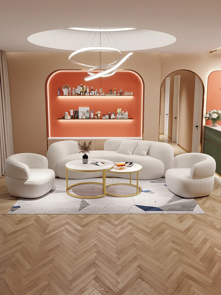 Cream style irregular beauty salon with curved sofas, modern and minimalist small unit design