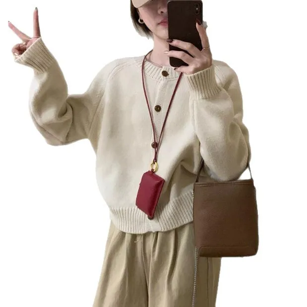 Design Sense: Solid Color, Simple Round Neck Knitted Cardigan for Women in Autumn and Winter, Lazy Style, Loose and Soft Texture 6