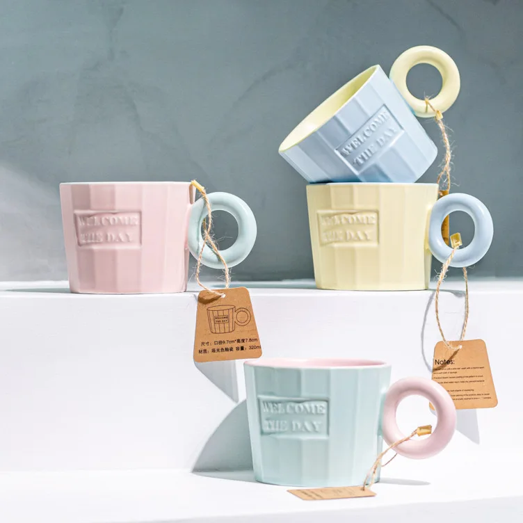 

The unique macaron colored ceramic mug with large ears is designed for coffee and tea lovers as a Christmas gift