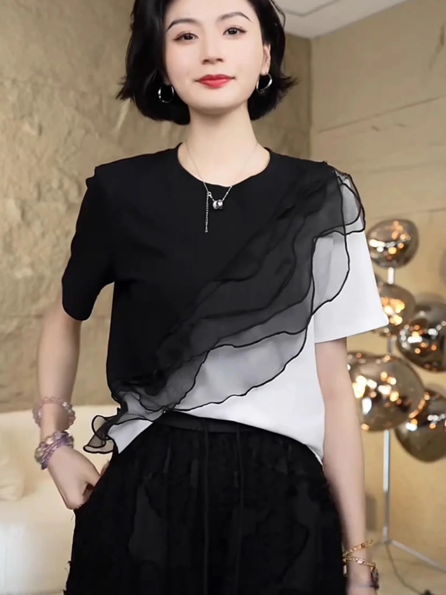 เสื้อยืดแฟชั่นผู้หญิงทรงหลวมสไตล์เกาหลีสำหรับฤดูร้อน