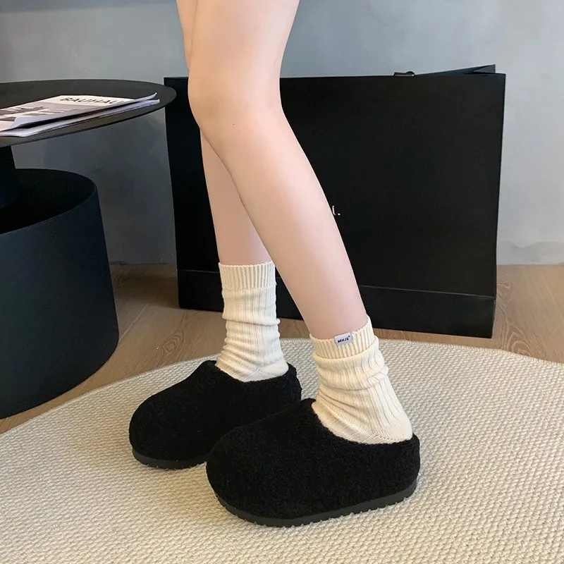 Versión coreana de zapatillas Niche Khmer, zapatos de algodón con plataforma exterior desgastados y fregona Baotou térmica de terciopelo