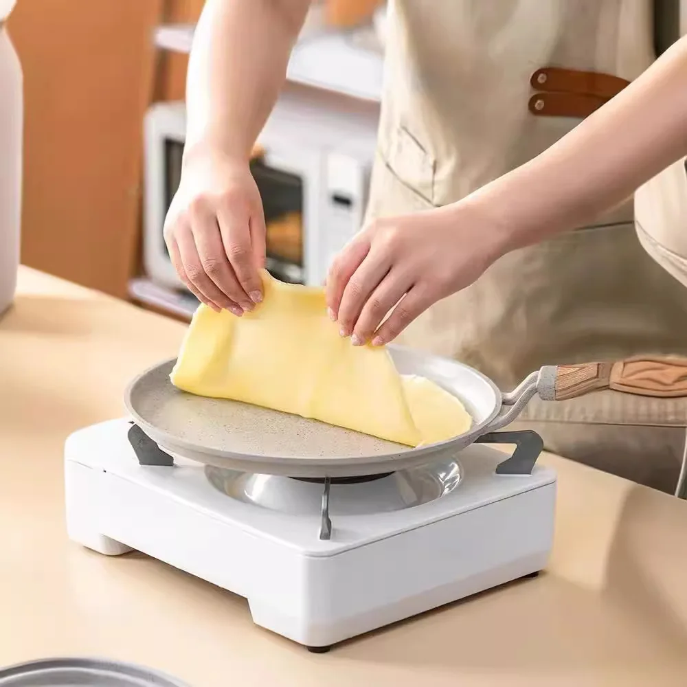 Sartén antiadherente para panqueques, apta para cocinas de inducción.