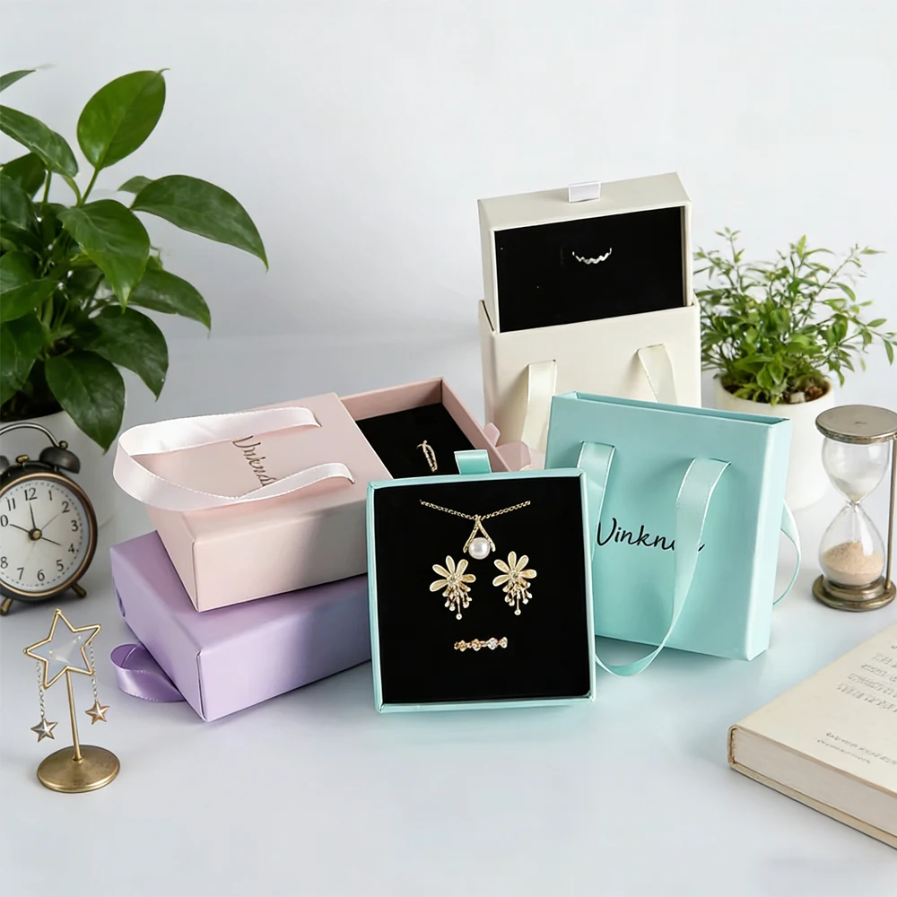 

Custom Black Luxury Cardboard Jewelry Gift Box with Ribbon Handle Sliding Paper Packaging Custom Logo for Necklaces Earring Ring