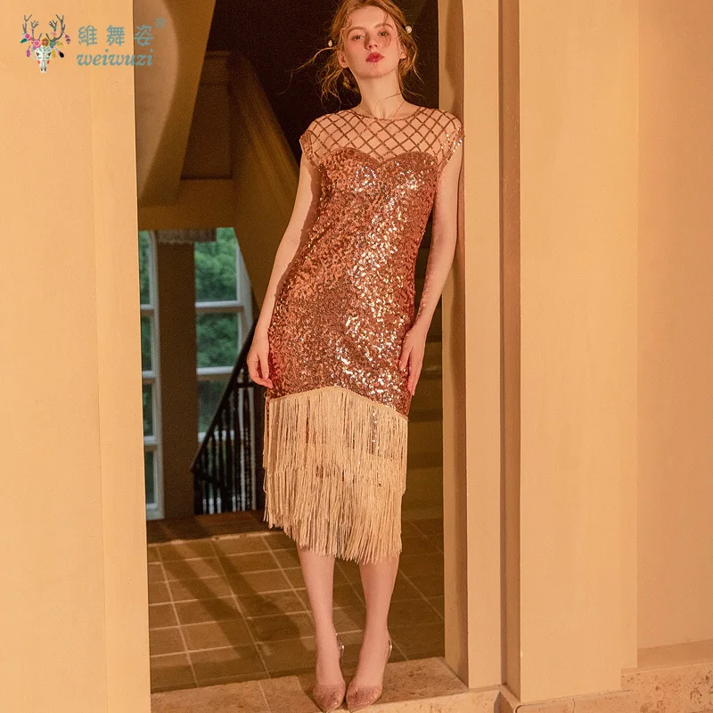 Abito femminile sexy con frange di paillettes O-Collo senza maniche Vedi attraverso la maglia aderente Abito con nappe stanche Abito da banchetto per feste con glitter