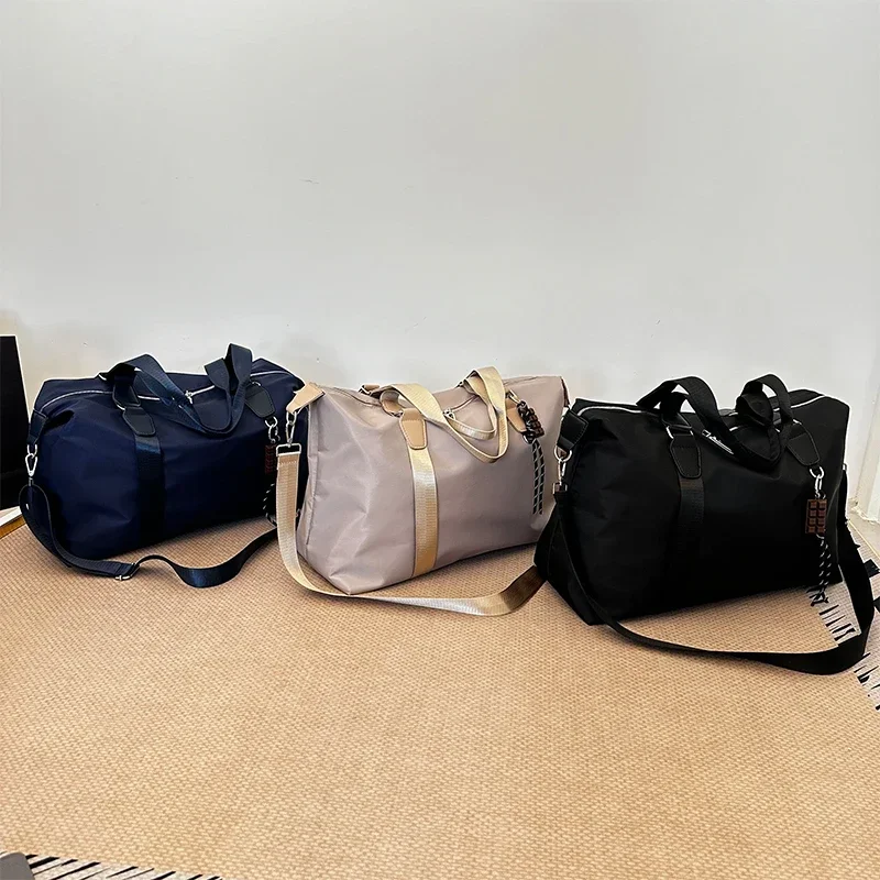 Bolso de viaje de alta calidad con cremallera no tejida 2025, bolso de hombro informal liso de gran capacidad, bolso cruzado suave y sencillo a la moda