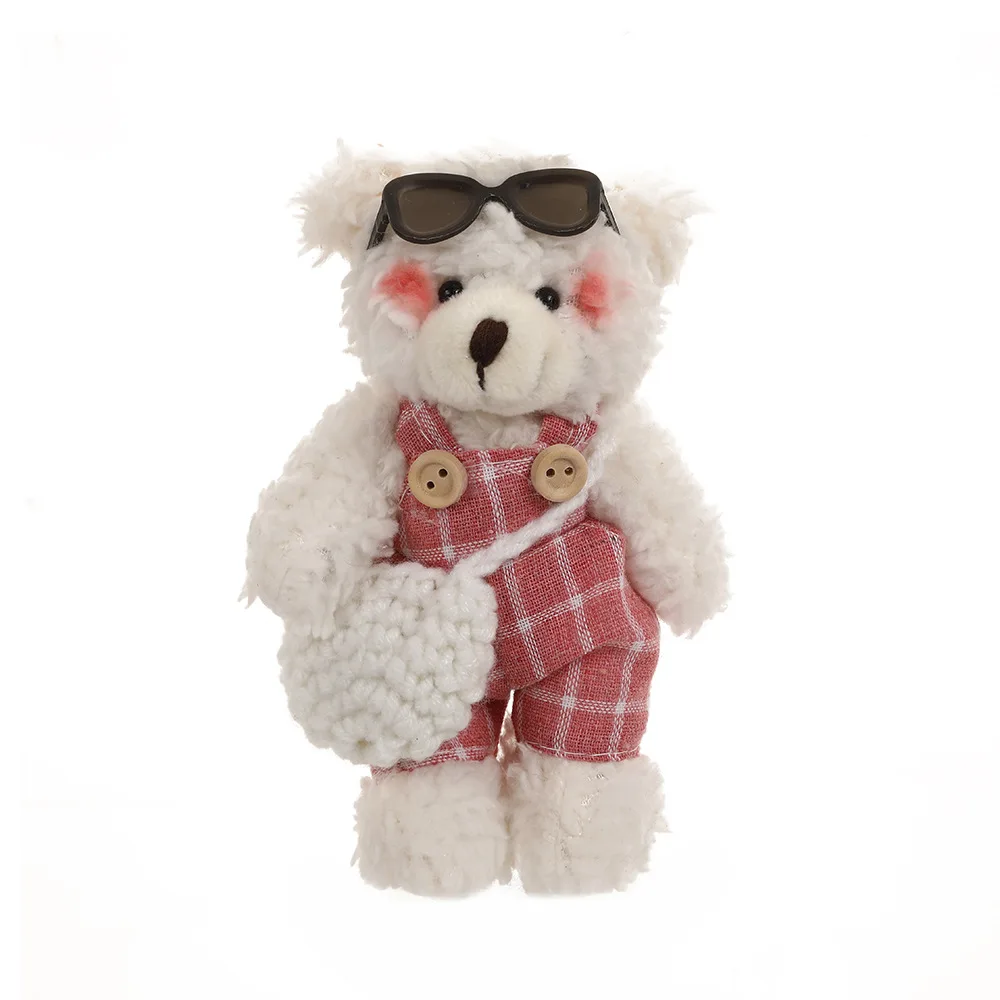 قلادة قطيفة، حقيبة كتف، نظارات شمسية، حقيبة ملابس كرتونية على شكل دب، سلسلة مفاتيح، دمية، إكسسوار هدايا للطلاب