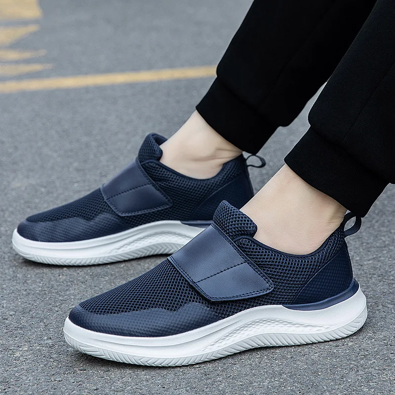 Lightweight soft-soled walking shoes non-slip and wear-resistant Velcro large opening middle-aged spring black new men's shoes