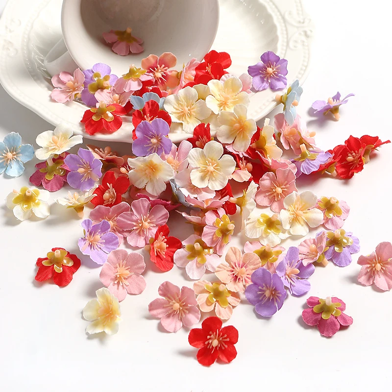 100 sztuk Mini sztuczne kwiaty sztuczne kwiaty głowy do wystroju domu dekoracja ślubna ślubne DIY Craft wieniec prezent akcesoria